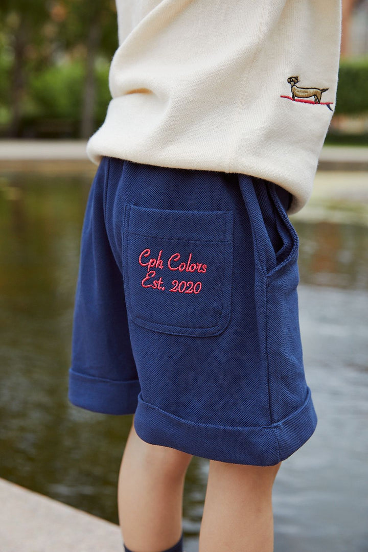 PIQUE SHORTS W. FOLD UP - NAVY COMB