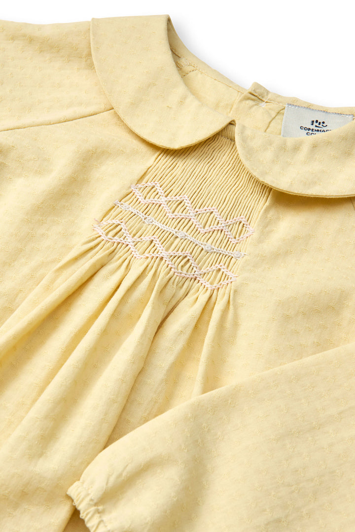 BLOUSE LS W. SMOCK EMB. - PALE YELLOW COMB.