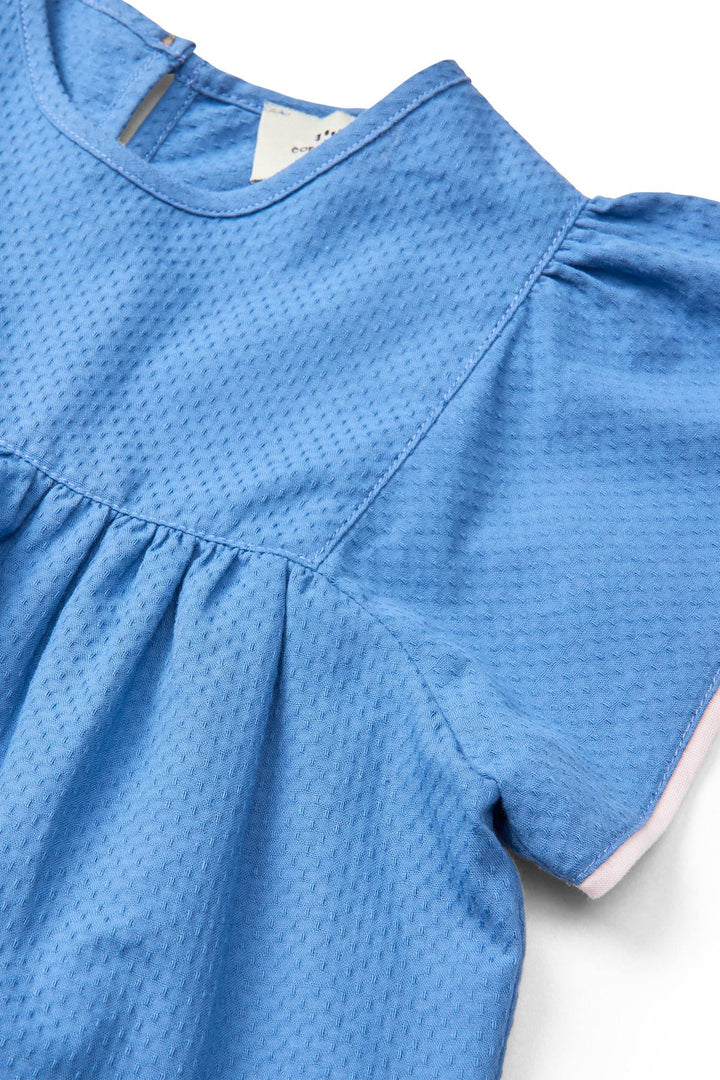 BLOUSE W. CONTRAST PIPING - OCEAN BLUE COMB.