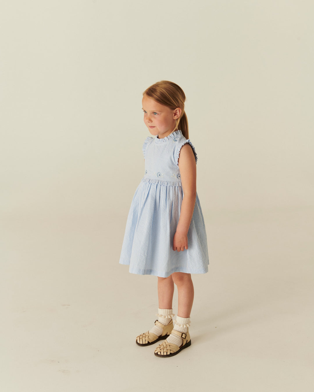 SEERSUCKER DRESS W. RUFFLES AND EMB. - SKY BLUE W CREAM STRIPE