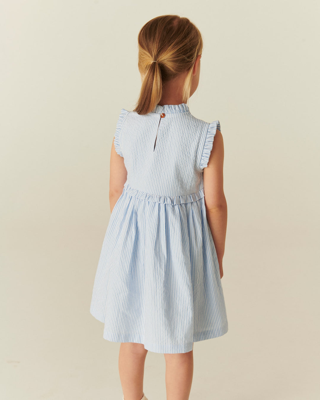 SEERSUCKER DRESS W. RUFFLES AND EMB. - SKY BLUE W CREAM STRIPE