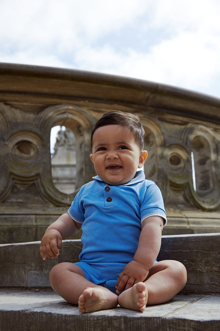 PIQUE POLO ROMPER - SKY BLUE COMB