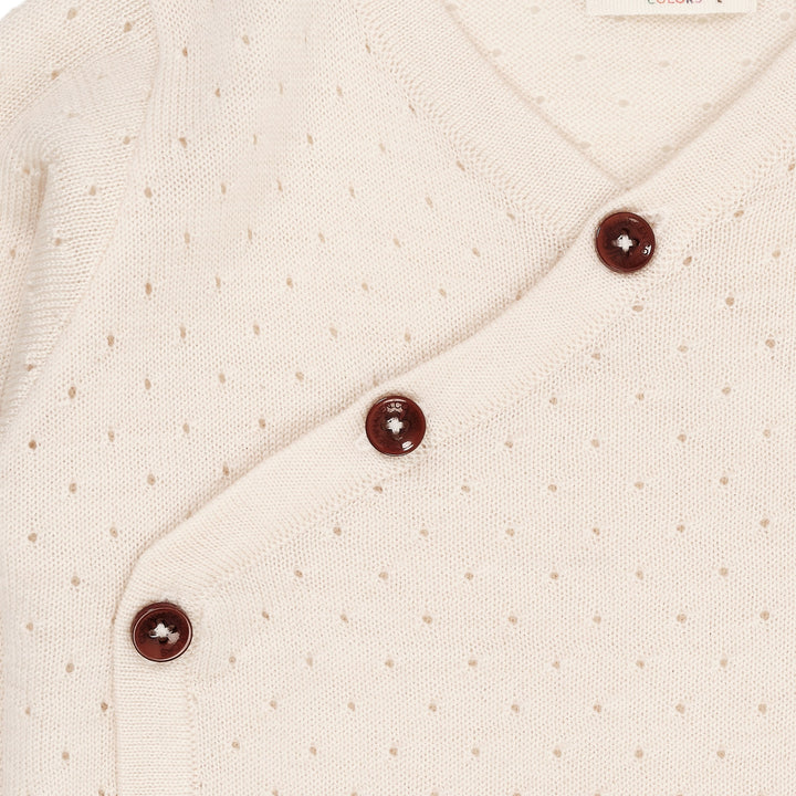 MERINO CROSSOVER CARDIGAN W. HOLE PATTERN - CREAM