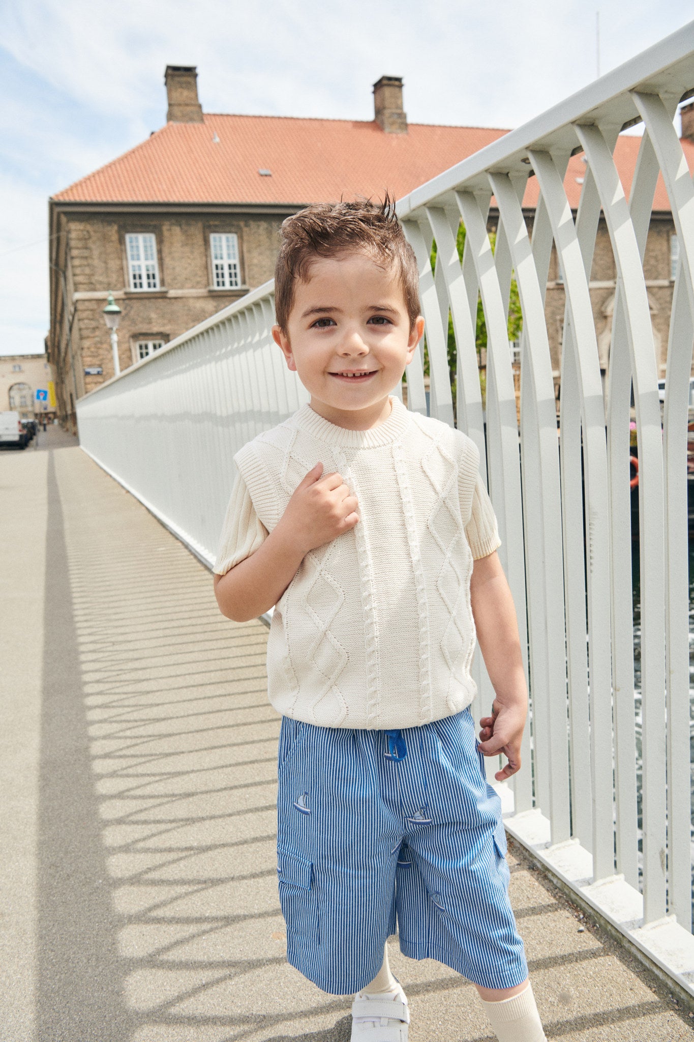 KNITTED CABLE VEST - CREAM